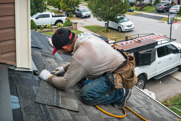 Professional Roofing technician working in Belmont, NH